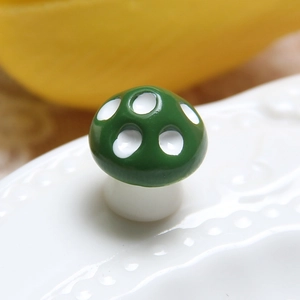 Miniature green mushroom decor with white dots for micro landscapes and DIY crafts