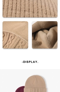 Detail of camel knitted beanie showing thick ribbed texture and cable knit brim design