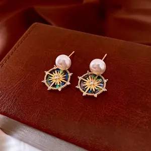18k gold plated stud earrings with pearls and aurora starburst pendants with crystals