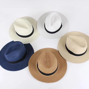 Variety of classic Panama straw hats for summer beach sun protection in multiple colors