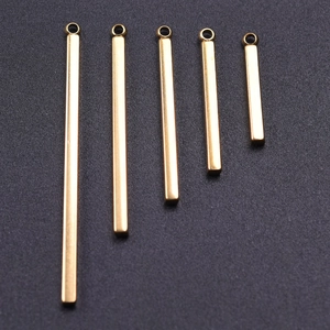 Detailed macro view of 304 stainless steel gold bar pendants in five various lengths