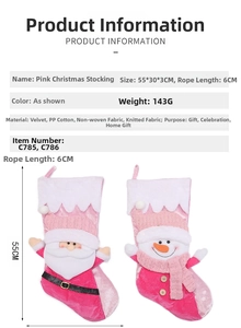Pink Christmas stocking detail showing 55x30cm dimensions and soft knitted fabric texture