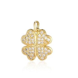Detail view of a gold clover pendant with sparkling clear cubic zirconia and top link ring