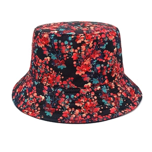 Detailed close-up of double-sided floral bucket hat with reinforced stitching and twill fabric