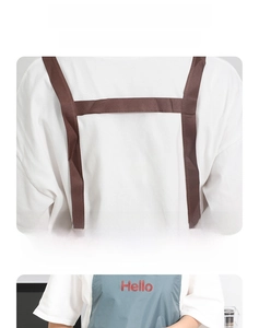 Detail view of the waterproof kitchen apron showing the ergonomic H-shaped shoulder straps