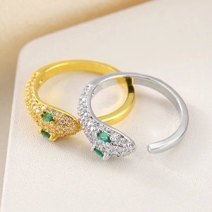 Luxurious gold and silver leopard head open rings with pavé crystals and green gem eyes