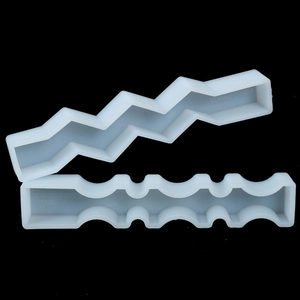 Macro detail of geometric wave silicone molds for DIY scented candle making