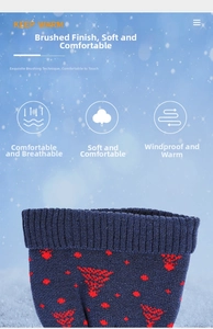 Close-up of soft brushed knit fabric with red Christmas tree pattern for winter warmth