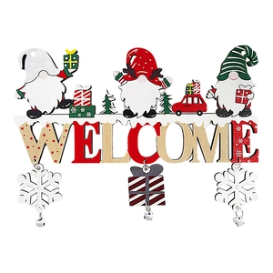 Wooden Christmas gnome welcome sign with red white and green festive ornaments