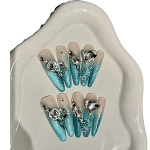 Blue cat eye stiletto press-on nails with luxury rhinestones and silver micro-beads