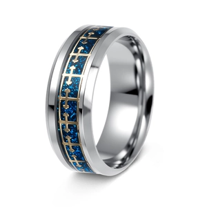 Detail of silver stainless steel ring featuring blue galaxy inlay and golden crosses