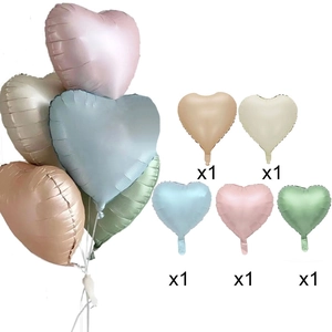 Detail showing five heart-shaped foil balloons in soft pastel Morandi matte colors