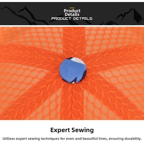 Detail of the orange mesh hat top showing blue floral button and durable radial stitching