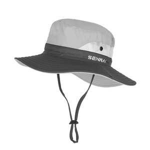 Detail view of quick-dry sun hat showing breathable mesh panels and adjustable wind cord