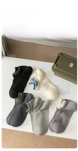 Flat lay of five pairs of cotton invisible socks with contrast color ribbed cuffs