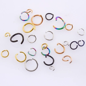Assorted colorful DIY jump rings in gold, silver, and black for jewelry making