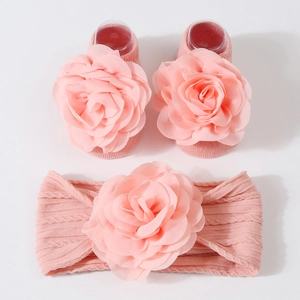 Ensemble bandeau et chaussettes en tricot rose pour bébé avec fleurs en tissu
