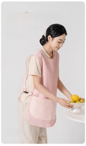 Pink breathable mesh apron with adjustable side buckles and large storage pockets