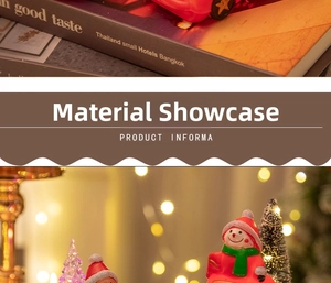 Detail of festive snowman and glowing Christmas tree desk ornaments for holiday decor