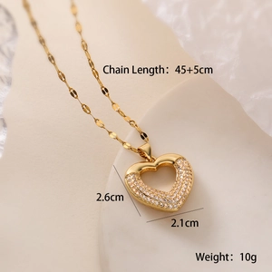 Macro shot showing 18K gold plated heart pendant specifications on a stone background