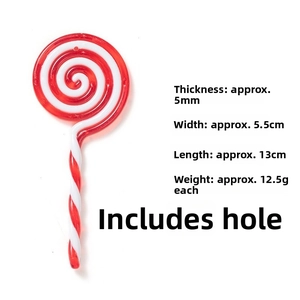 Detailed view of red and white candy cane ornament showing dimensions 13cm by 5.5cm