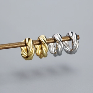 Polished S925 sterling silver twisted hoop earrings in gold and silver finishes