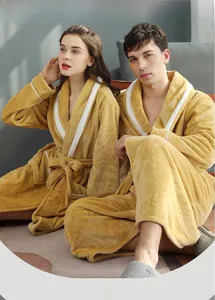 Detail of couple in thick flannel bathrobes with contrast piping and shawl collar