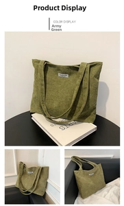 Detail view of large army green corduroy tote bag showing textured fabric and fashion label
