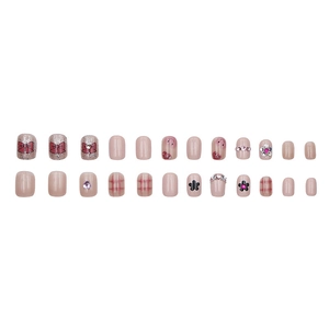Pink press-on nail kit with 24pcs glitter bows floral hearts and checkered patterns