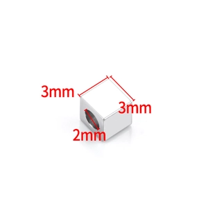 Macro detail of 3mm silver stainless steel cube spacer beads for jewelry making