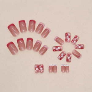 French tip press-on nails set with cute floral patterns and sweet pink gradient design