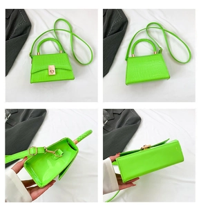Detailed views of lime green croc-embossed handbag with gold clasp and woven handle