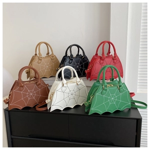 Gothic bat-shaped handbags with spider web stitching in diverse retro punk colors