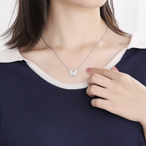 Elegant butterfly pendant necklace with white mother of pearl and diamond on a silver chain