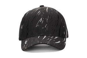 Close-up of black baseball cap featuring silver marble texture and curved brim detail