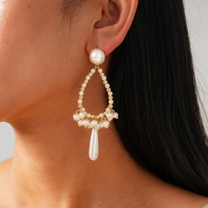 Vintage gold pearl drop earrings with Baroque water drop design for an elegant woman look