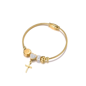 Golden woven steel wire bracelet with heart, cross, and religious medal charms