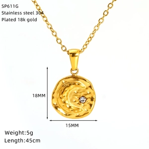 Detailed view of 18k gold plated stainless steel sun and moon pendant with zircon