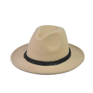 Detail of beige wool felt fedora featuring a stylish thick black chain decorative band