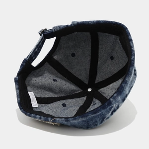 Internal view of Japanese retro denim docker hat with silver metal adjustment buckle