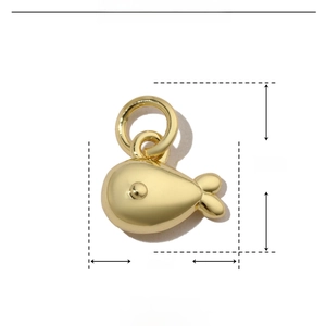Macro detail of golden fish pendant with precise 11mm by 9mm size dimensions