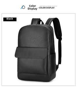 Detail view of black pebble leather business backpack featuring large front zipper pocket