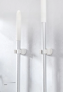 Waterproof adhesive mop holder on marble tile wall for bathroom organization