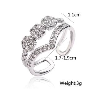 Detail view of silver zircon geometric ring with size specs 1.1cm width and 3g weight