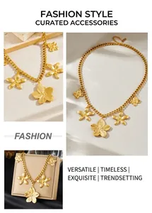 Detail of gold flower pendants with brushed texture on a chunky Cuban link chain
