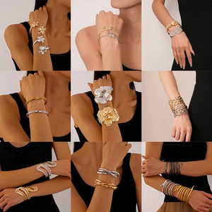 Irregular geometric metal bangles in gold, silver, and black finish for a stylish look