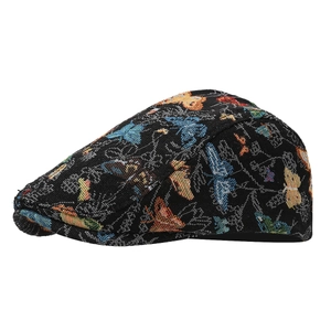 Vintage jacquard ivy cap with colorful butterfly pattern on a textured fabric base