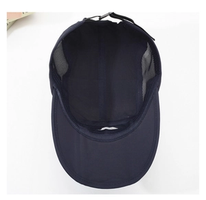 Breathable mesh panels and adjustable strap detail inside this foldable navy sun hat