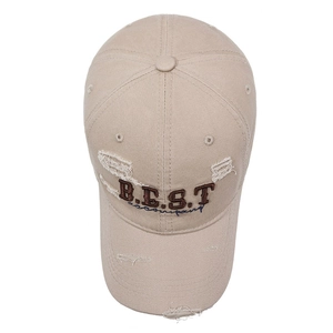 Distressed khaki baseball cap with BEST embroidery and vintage ripped details on brim