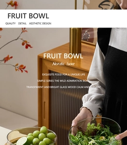 Close-up of a Nordic glass salad bowl with a wooden base in a lifestyle setting